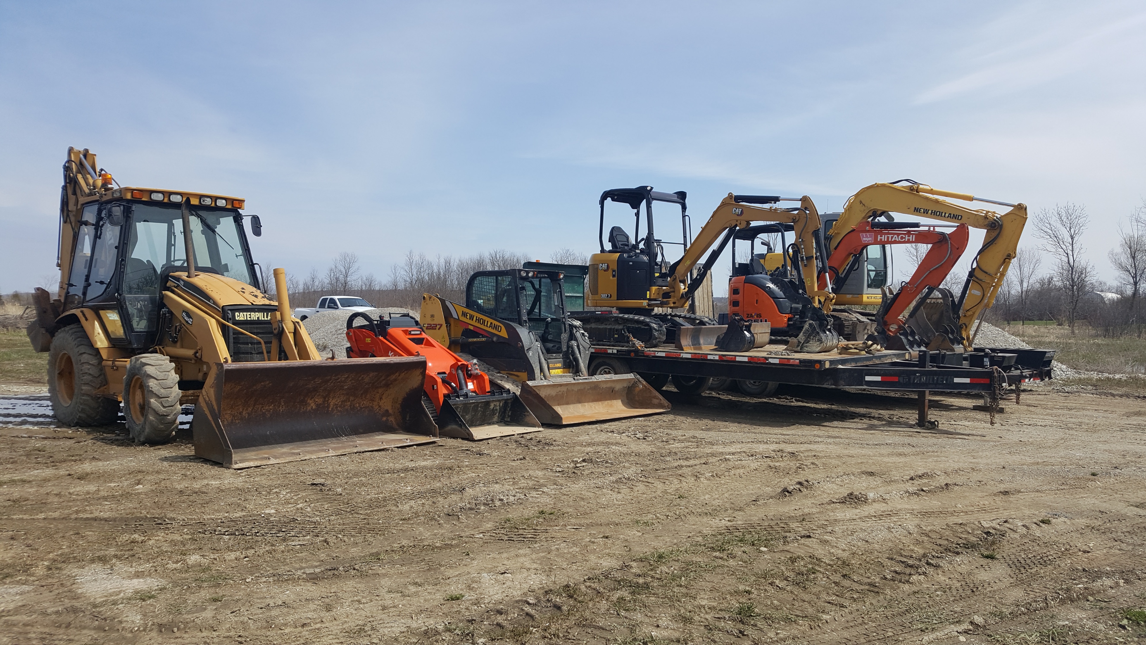 Backhoe and Skid Steers for Rent